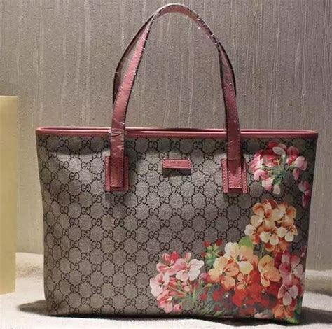 211137 gucci tote blooms|Gucci Bloom pouch.